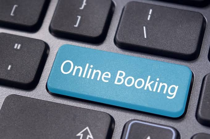 A keyboard key labelled Online Booking